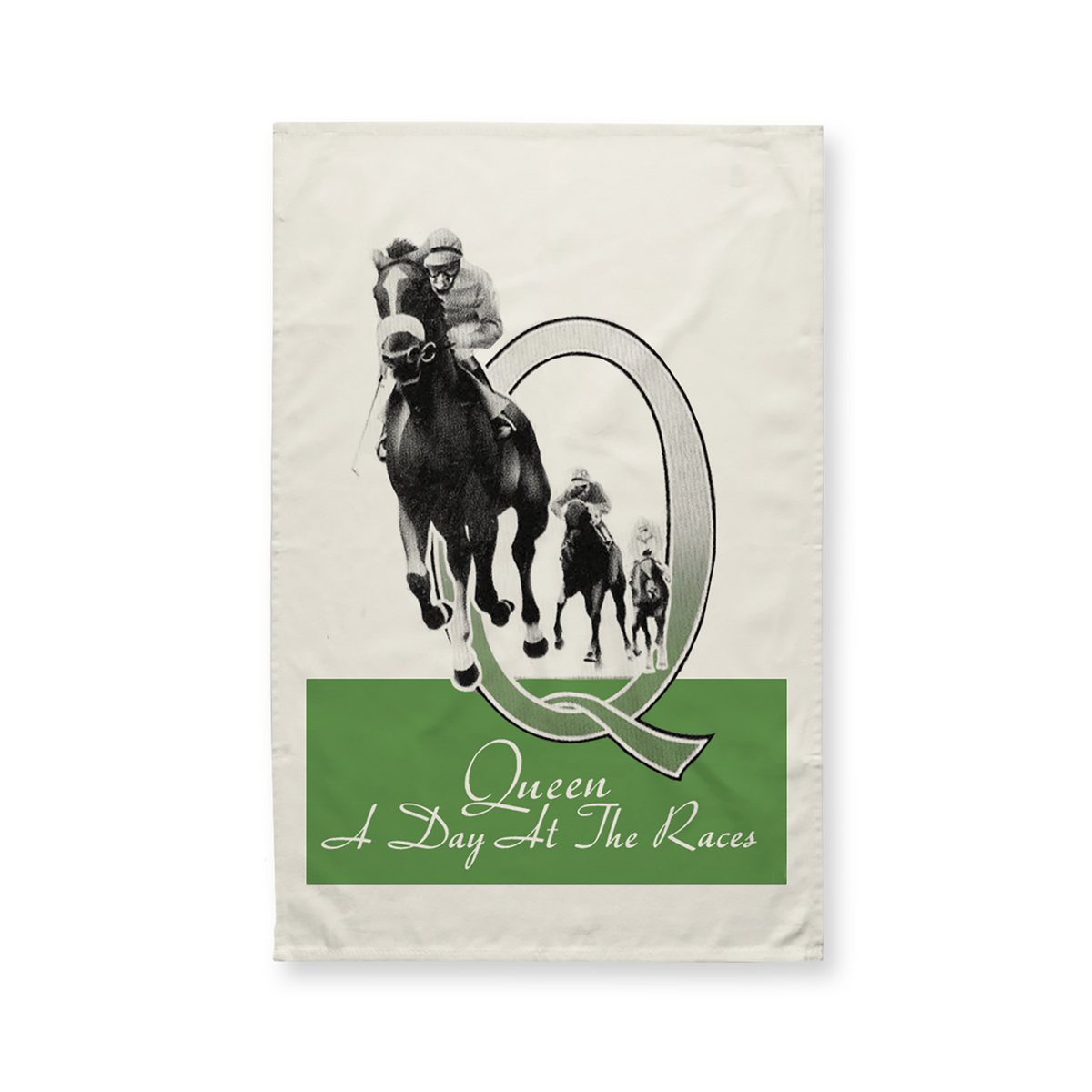 A rectangular tea towel featuring a vintage-style jockey and horse graphic inside a large letter Q, with a green band at the bottom reading 'Queen A Day At The Races' on an off-white background.